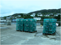 Stacks of lobster pots in Tarbert – nowhere to buy any.png