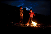Wild kids are happy kids. Michal and Martin by the last campfire of their trip..png